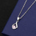 Pear-shaped pendant with pink diamond cross chain