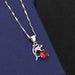 Dolphin pendant with red diamond on the melon seed chain