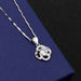 Clover B pendant with white diamonds on a melon seed chain