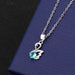 Swan pendant with blue diamond cross chain