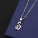 Swan pendant with purple diamond cross-chain