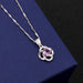 Clover B pendant with purple diamond with melon seed chain